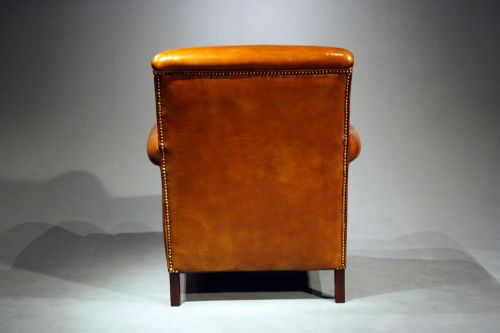 fig 8. A Pair of Leather Armchairs on Tapering Feet