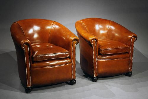 fig 1. Antique leather Tub Chairs