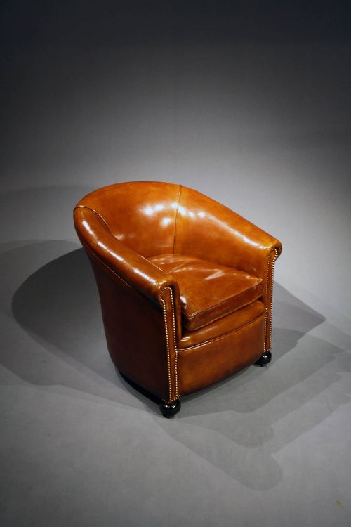 fig 2. Antique leather Tub Chairs