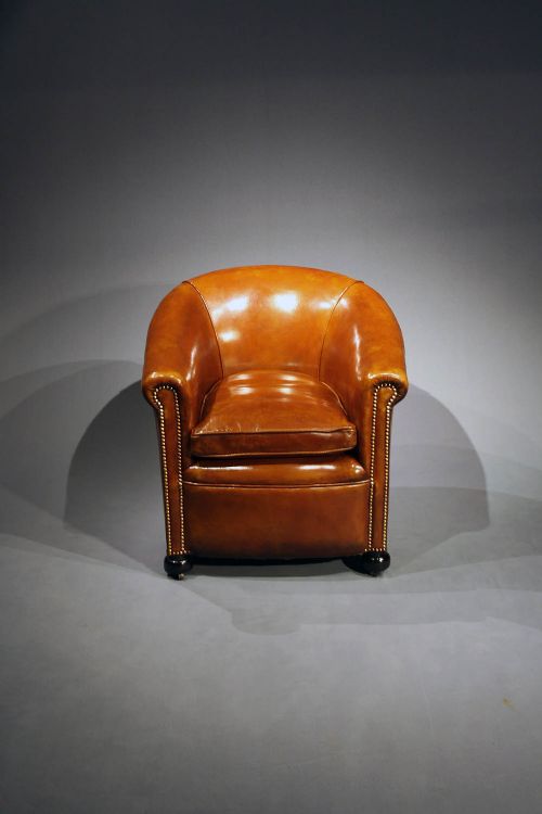 fig 4. Antique leather Tub Chairs