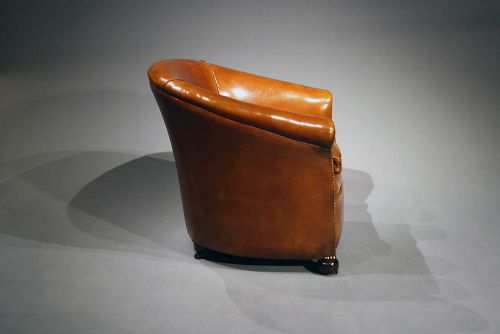 fig 5. Antique leather Tub Chairs