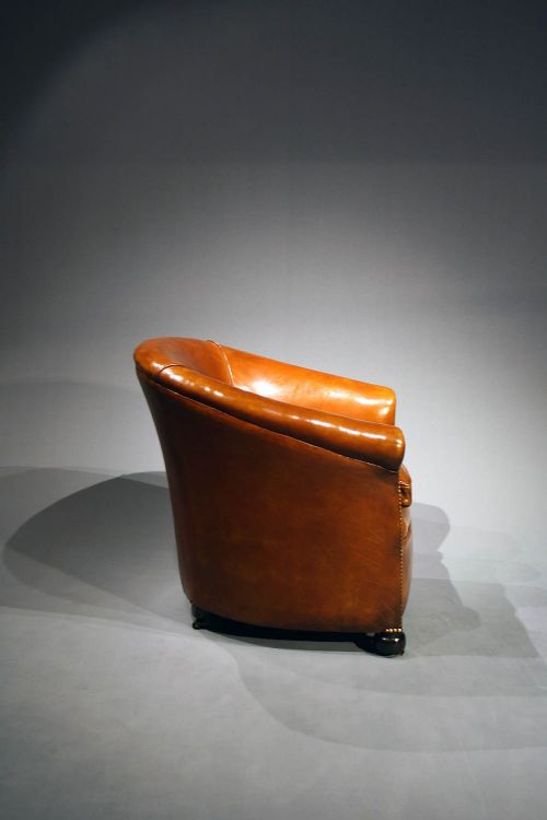 fig 6. Antique leather Tub Chairs