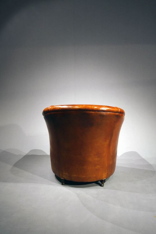 fig 7. Antique leather Tub Chairs