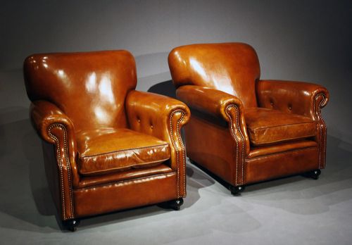 A Pair of Antique Leather Club Chairs