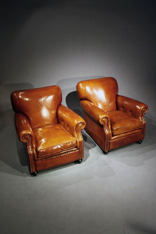 fig 2. A Pair of Antique Leather Club Chairs