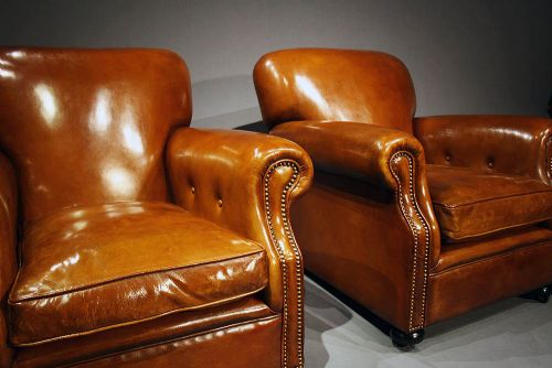 fig 3. A Pair of Antique Leather Club Chairs