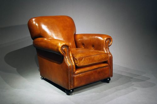 fig 4. A Pair of Antique Leather Club Chairs