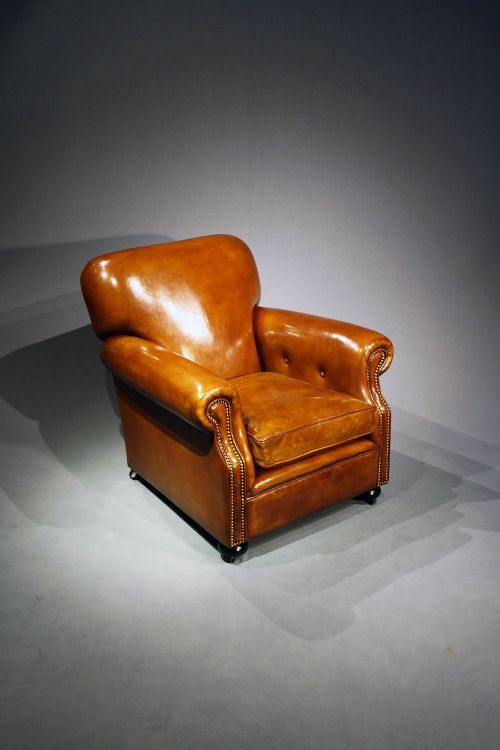fig 5. A Pair of Antique Leather Club Chairs