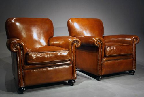 A Quality Pair of Antique Leather Armchairs
