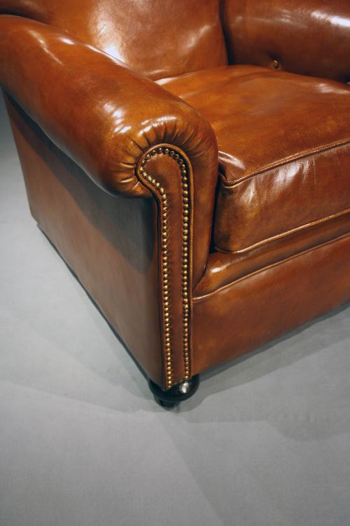 fig 4. A Quality Pair of Antique Leather Armchairs