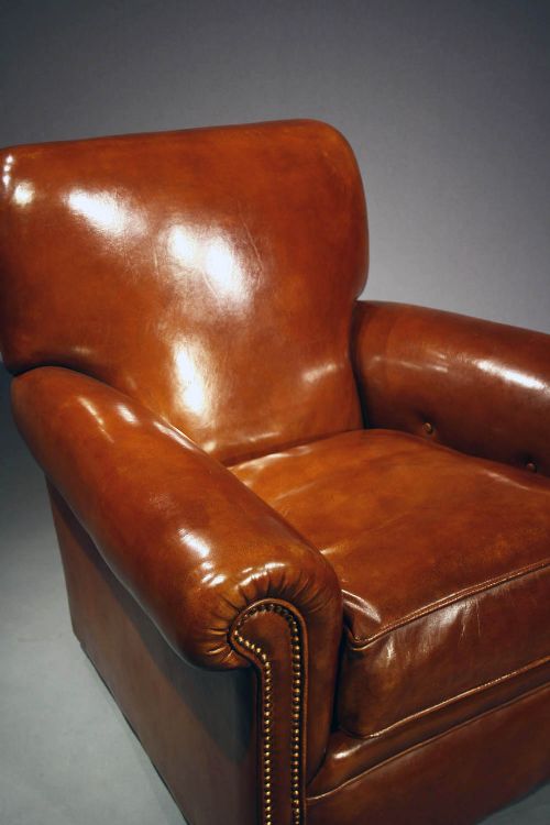 fig 5. A Quality Pair of Antique Leather Armchairs