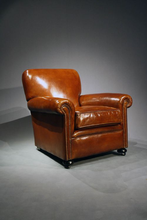 fig 7. A Quality Pair of Antique Leather Armchairs
