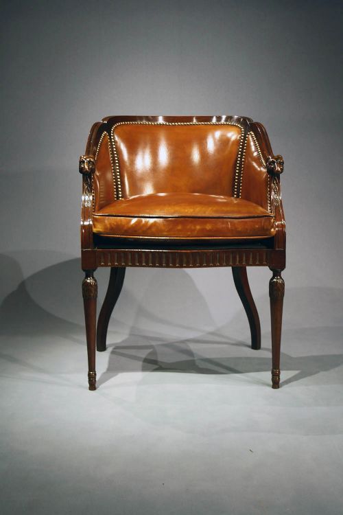 fig 8. A Quality Antique Leather Tub Chair