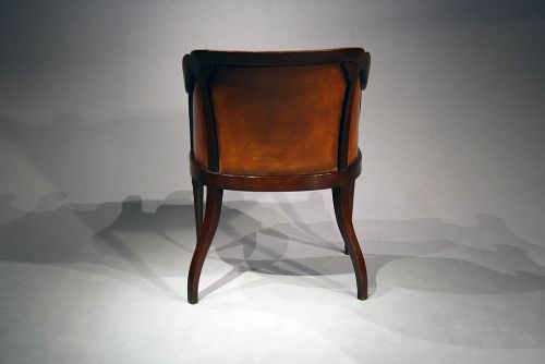 fig 6. A Quality Antique Leather Tub Chair
