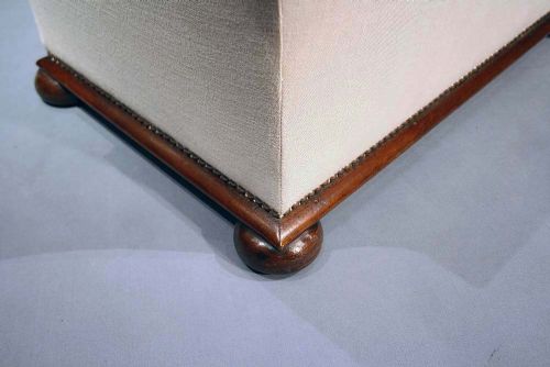 fig 7. Victorian Shaped Ottoman Upholstered in Linen