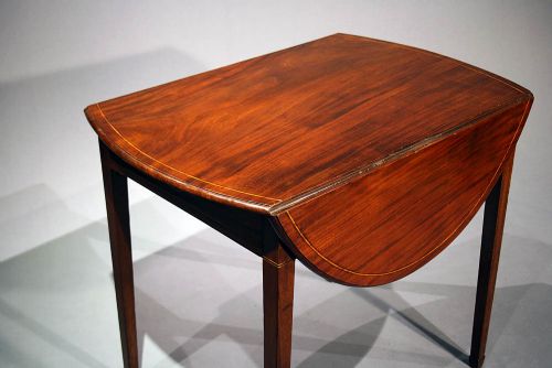fig 7. A Georgian Inlaid Pembroke Table