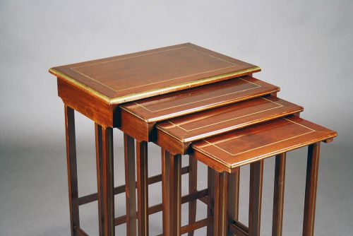 fig 1. A French Nest of Four Brass Inlaid Tables