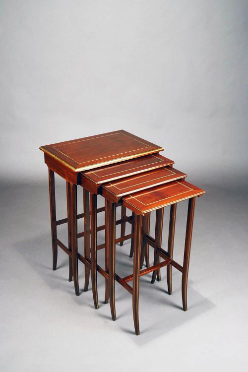 fig 2. A French Nest of Four Brass Inlaid Tables