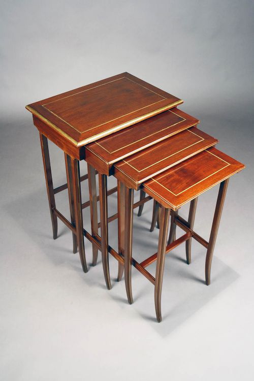 fig 3. A French Nest of Four Brass Inlaid Tables