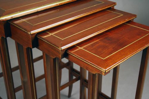 fig 4. A French Nest of Four Brass Inlaid Tables