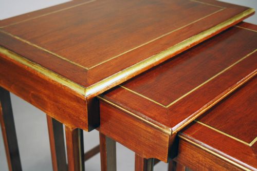 fig 5. A French Nest of Four Brass Inlaid Tables