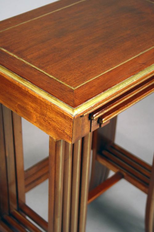 fig 7. A French Nest of Four Brass Inlaid Tables