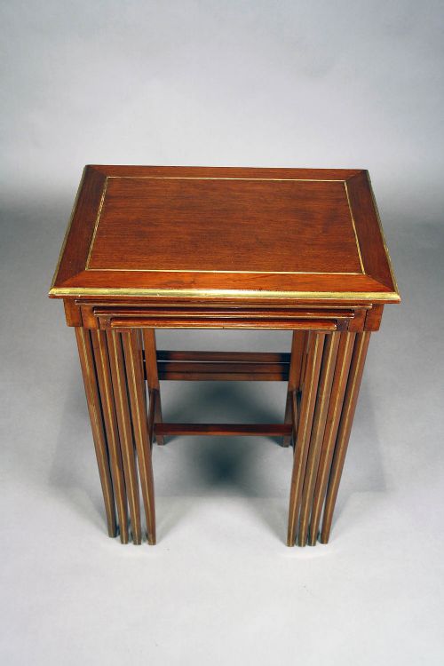 fig 10. A French Nest of Four Brass Inlaid Tables