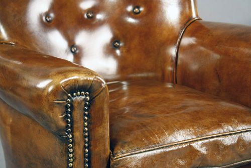 fig 4. A pair of Antique Leather Shaped Armchairs
