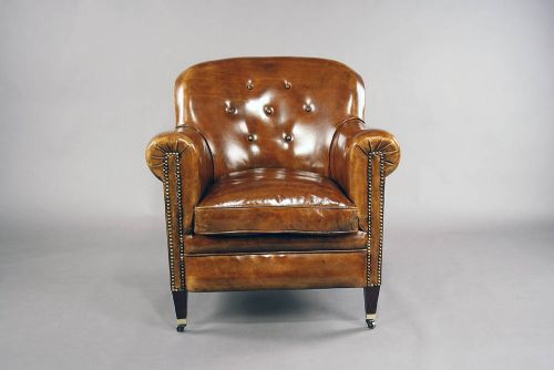 fig 8. A pair of Antique Leather Shaped Armchairs