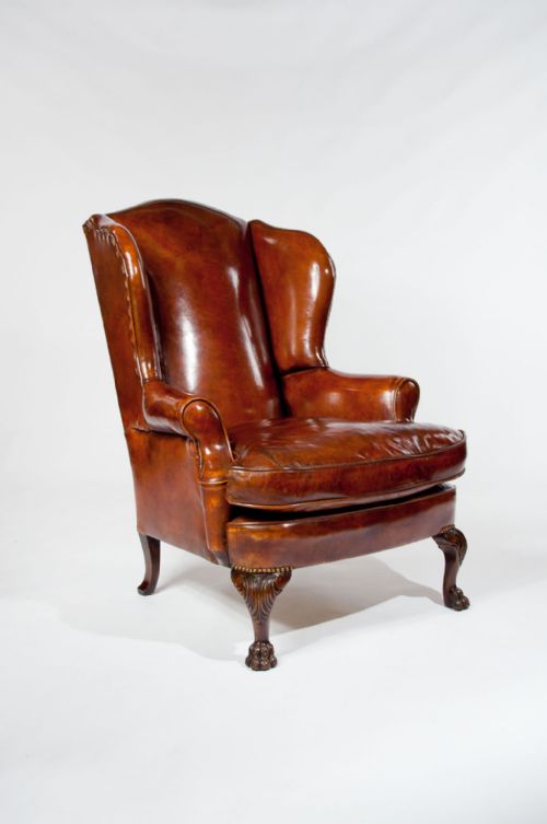fig 2. Antique Leather Upholstered Wing Chair