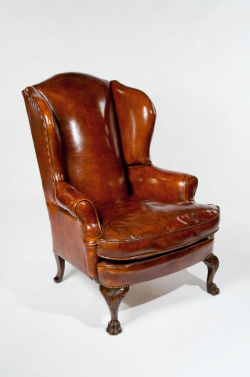 fig 3. Antique Leather Upholstered Wing Chair