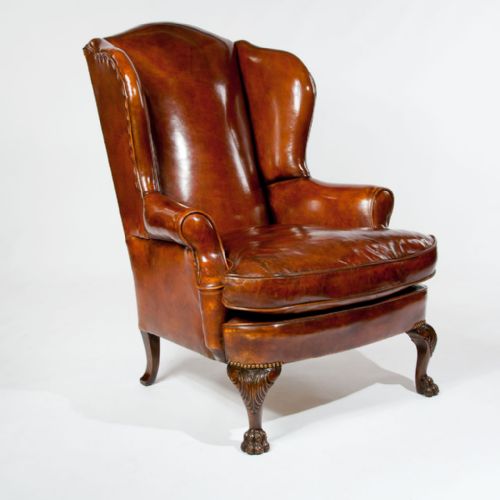 fig 4. Antique Leather Upholstered Wing Chair