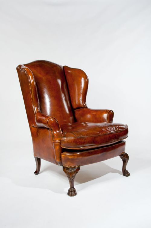 fig 5. Antique Leather Upholstered Wing Chair