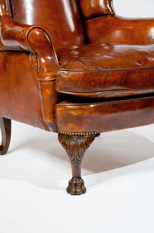 fig 7. Antique Leather Upholstered Wing Chair