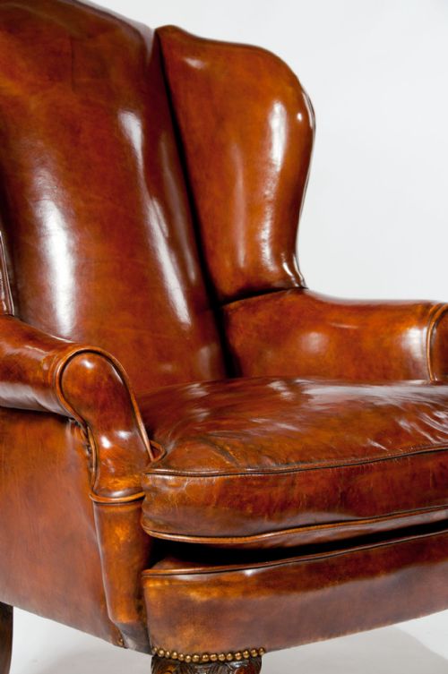 fig 6. Antique Leather Upholstered Wing Chair