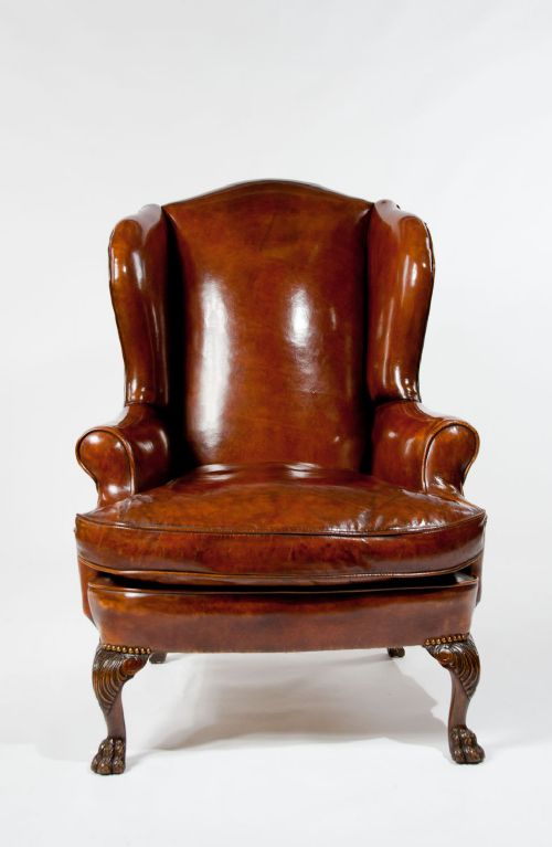fig 9. Antique Leather Upholstered Wing Chair