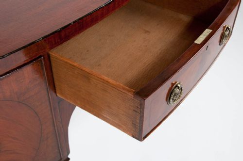 fig 9. A late 19th Century Mahogany Bow Sideboard