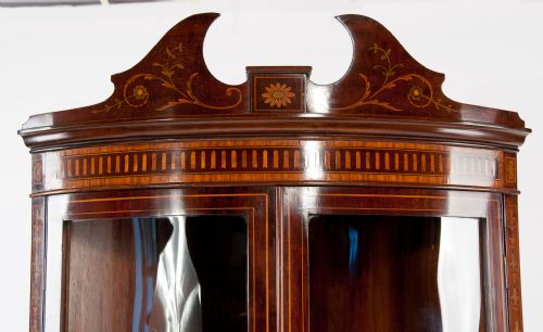 fig 1. A Very Fine Bow Fronted Inlaid Corner Cabinet