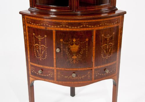 fig 3. A Very Fine Bow Fronted Inlaid Corner Cabinet