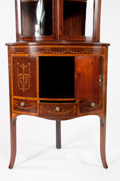 fig 7. A Very Fine Bow Fronted Inlaid Corner Cabinet
