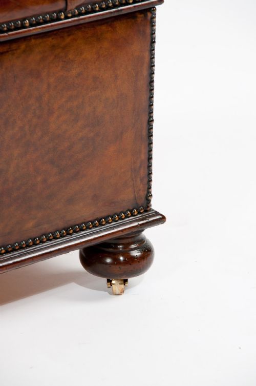 fig 2. Antique Leather Upholstered Box Ottoman