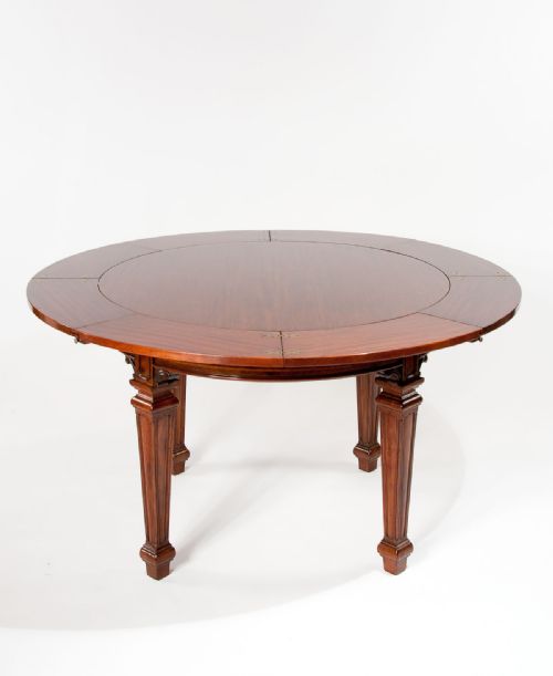 A Rare Jupe Extending Table Waring & Gillows