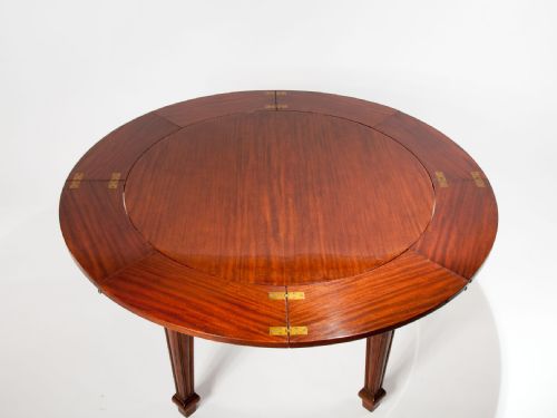 fig 9. A Rare Jupe Extending Table Waring & Gillows