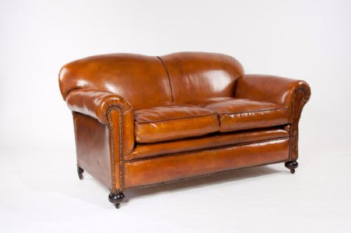 fig 6. A Quality Edwardian Drop Arm Tan Leather Sofa