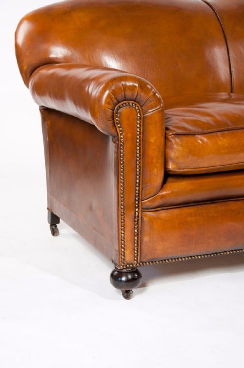 fig 8. A Quality Edwardian Drop Arm Tan Leather Sofa