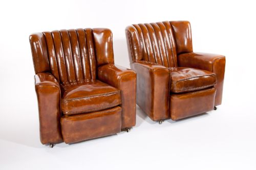 fig 10. A SUPERB PAIR OF ART DECO LEATHER UPHOLSTERED CLUB CHAIRS