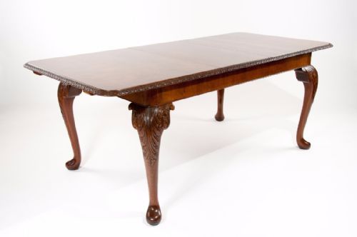 fig 7. A Quality Burr Walnut Extending Dining Table
