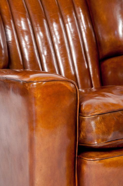 fig 3. A SUPERB PAIR OF ART DECO LEATHER UPHOLSTERED CLUB CHAIRS