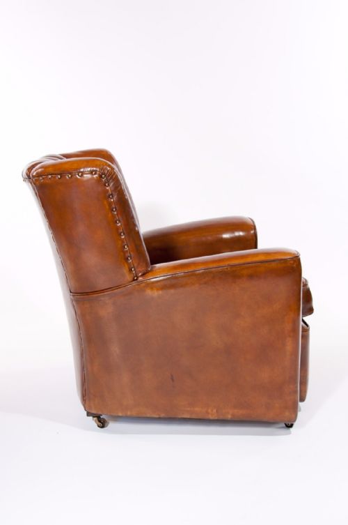 fig 7. A SUPERB PAIR OF ART DECO LEATHER UPHOLSTERED CLUB CHAIRS