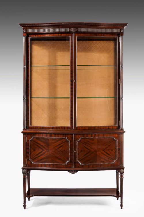 A Fine Quality Edwardian Serpentine Shaped Display Cabinet